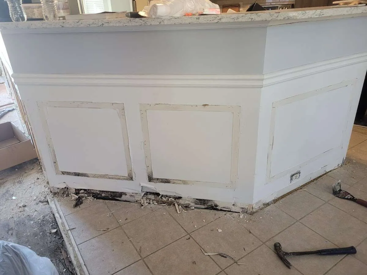 Water damage and mold on kitchen during Storm Damage Restoration in Clovis